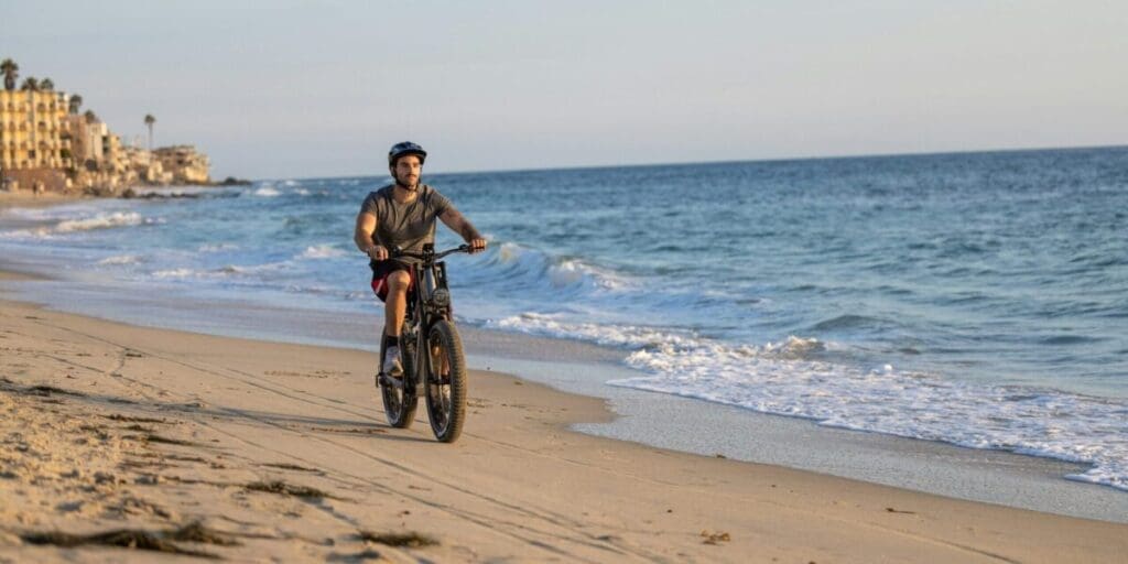 Man Riding a eBike Down The Beach - Beautiful Scenic eBike Ride