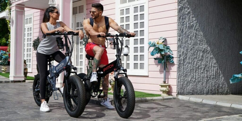 Man and Woman Begin Riding Electric Bikes - Family Fun e-Bike Adventure